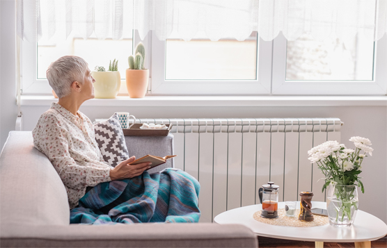 Woman in deep thought on couch