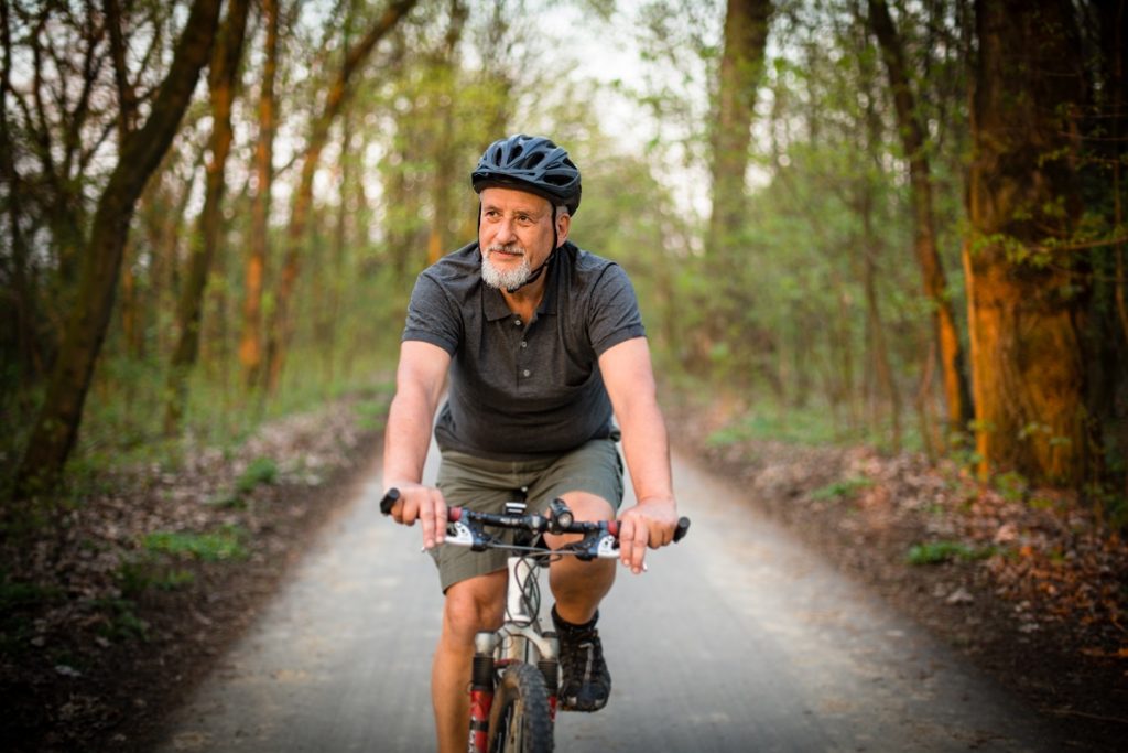 Senior man on a bike