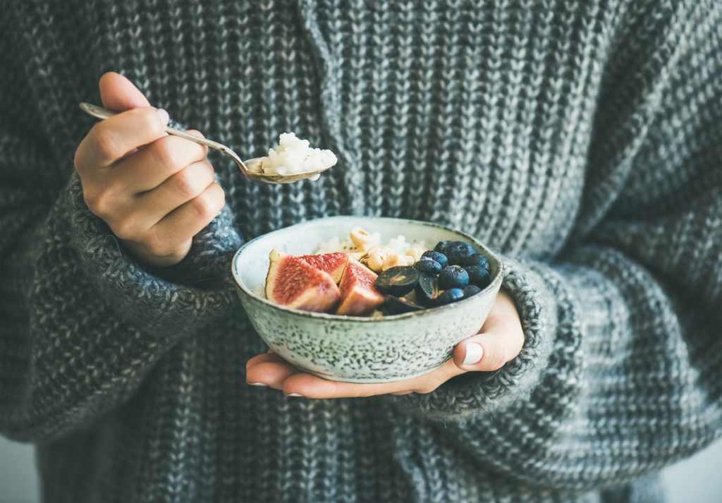 Woman eating oatmeal