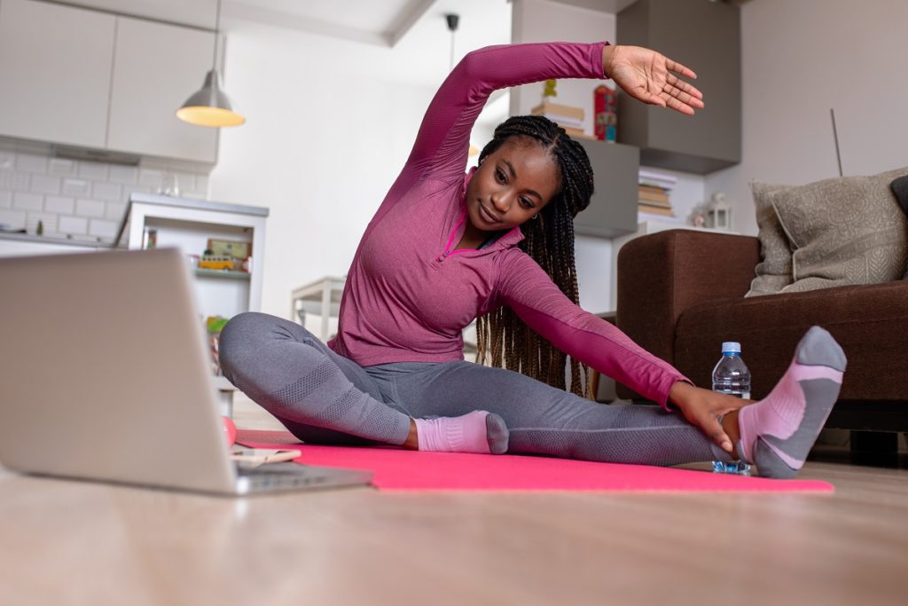 Woman exercising at home