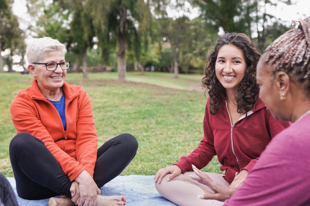 Women socializing in city park