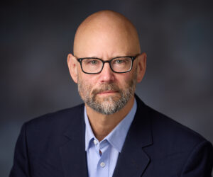 a portrait of Dr. Andrew Rose-Innes.